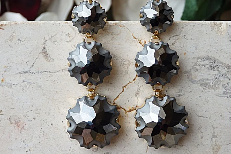 Dark grey earrings.