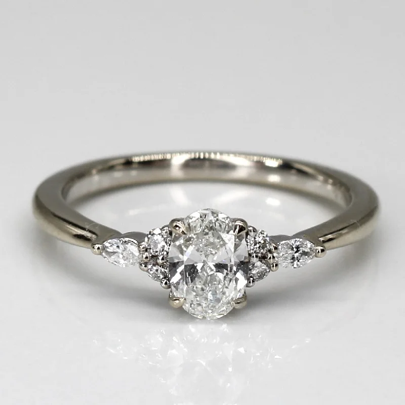 Oval Diamond Solitaire with Accent Diamonds 18k Ring | 0.5ctw, 0.06ctw, 0.04ctw | SZ 6 3/4 |